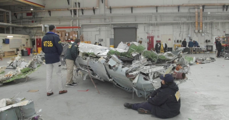 D.C. plane crash investigators say Black Hawk crew may not have heard order to go behind plane